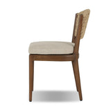 A fresh take on the traditional woven style, this outdoor dining chair features a faux banana leaf material wrapped in a bold, chunky texture around FSC®-certified teak framing. Cover or store indoors during inclement weather and when not in use. Amethyst Home provides interior design, new home construction design consulting, vintage area rugs, and lighting in the Seattle metro area.