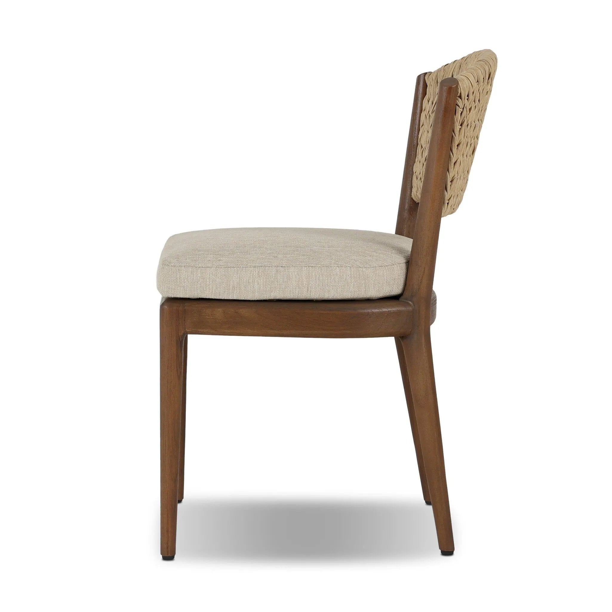 A fresh take on the traditional woven style, this outdoor dining chair features a faux banana leaf material wrapped in a bold, chunky texture around FSC®-certified teak framing. Cover or store indoors during inclement weather and when not in use. Amethyst Home provides interior design, new home construction design consulting, vintage area rugs, and lighting in the Seattle metro area.