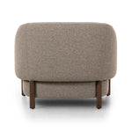 Featuring Audrey Weslie Feather Chair by Four Hands at Amethyst Home. This elevated arm chair features a clean top piece that partially overlaps its bottom counterpart and seamlessly blends the back cushion into the armrests in one fluid form. The seat's legs appear to extend from the seat and back, adding architectural interest. Upholstered in a recycled. Amethyst Home provides interior design, new home construction design consulting, vintage area rugs, and lighting in the Kansas City metro area.