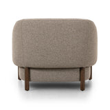 Featuring Audrey Weslie Feather Chair by Four Hands at Amethyst Home. This elevated arm chair features a clean top piece that partially overlaps its bottom counterpart and seamlessly blends the back cushion into the armrests in one fluid form. The seat's legs appear to extend from the seat and back, adding architectural interest. Upholstered in a recycled. Amethyst Home provides interior design, new home construction design consulting, vintage area rugs, and lighting in the Kansas City metro area.