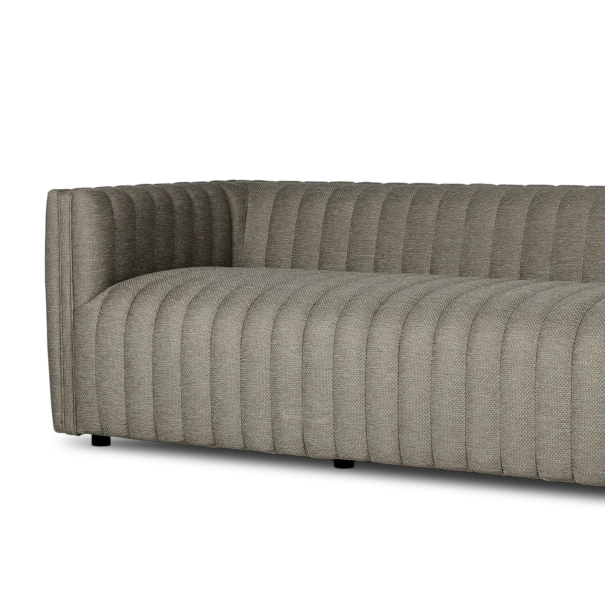 A dramatically channeled outdoor sofa with subtly textured upholstery for a clean, inviting look. Cover or store indoors during inclement weather and when not in use Amethyst Home provides interior design, new home construction design consulting, vintage area rugs, and lighting in the Dallas metro area.
