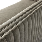 A dramatically channeled outdoor sofa with subtly textured upholstery for a clean, inviting look. Cover or store indoors during inclement weather and when not in use Amethyst Home provides interior design, new home construction design consulting, vintage area rugs, and lighting in the Houston metro area.