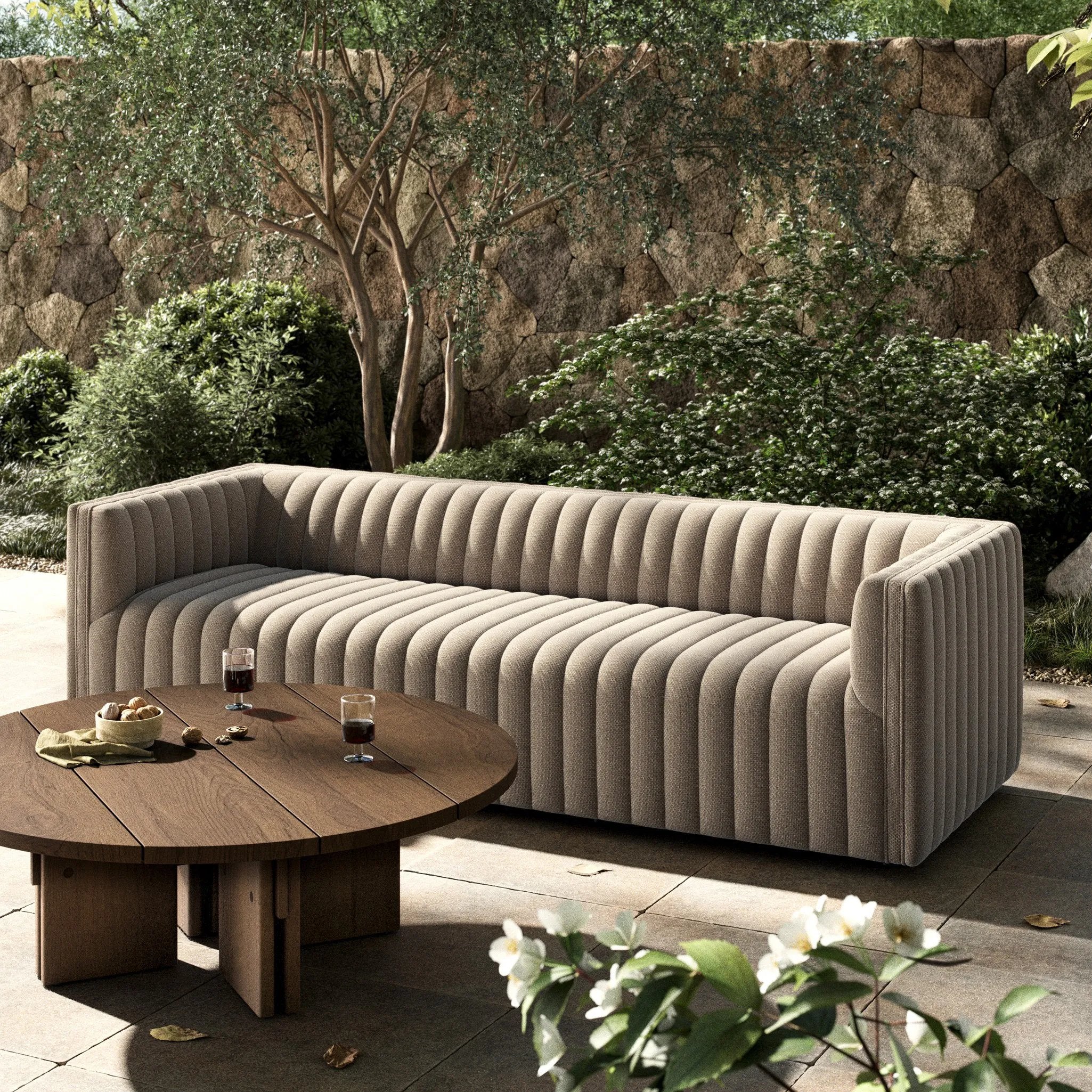 A dramatically channeled outdoor sofa with subtly textured upholstery for a clean, inviting look. Cover or store indoors during inclement weather and when not in use Amethyst Home provides interior design, new home construction design consulting, vintage area rugs, and lighting in the Omaha metro area.