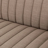 Velvety poly-blend seating takes on dramatic channeling and rich navy hue for trend-forward texture and sumptuous sit Amethyst Home provides interior design, new home construction design consulting, vintage area rugs, and lighting in the Alpharetta metro area.