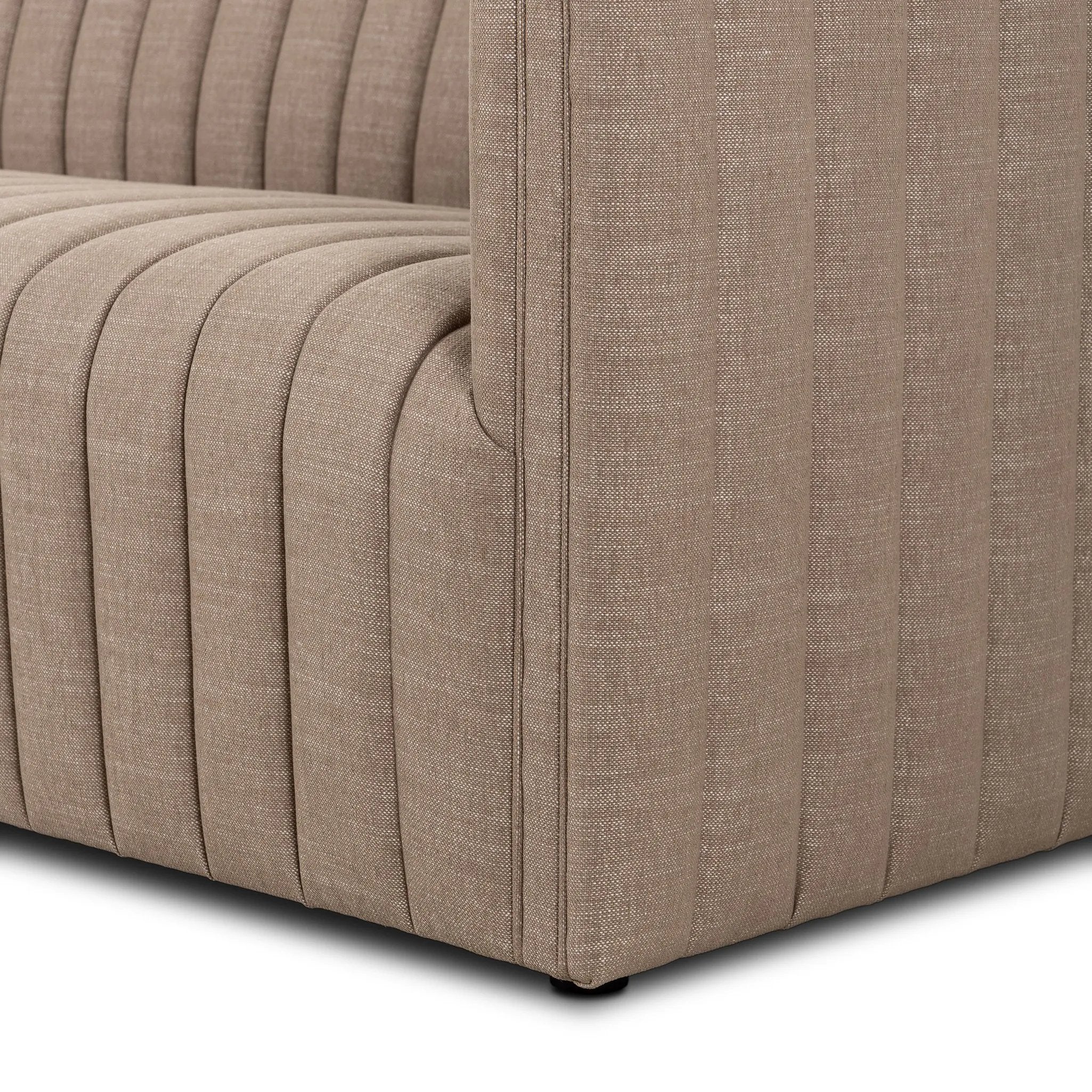 Velvety poly-blend seating takes on dramatic channeling and rich navy hue for trend-forward texture and sumptuous sit Amethyst Home provides interior design, new home construction design consulting, vintage area rugs, and lighting in the Charlotte metro area.