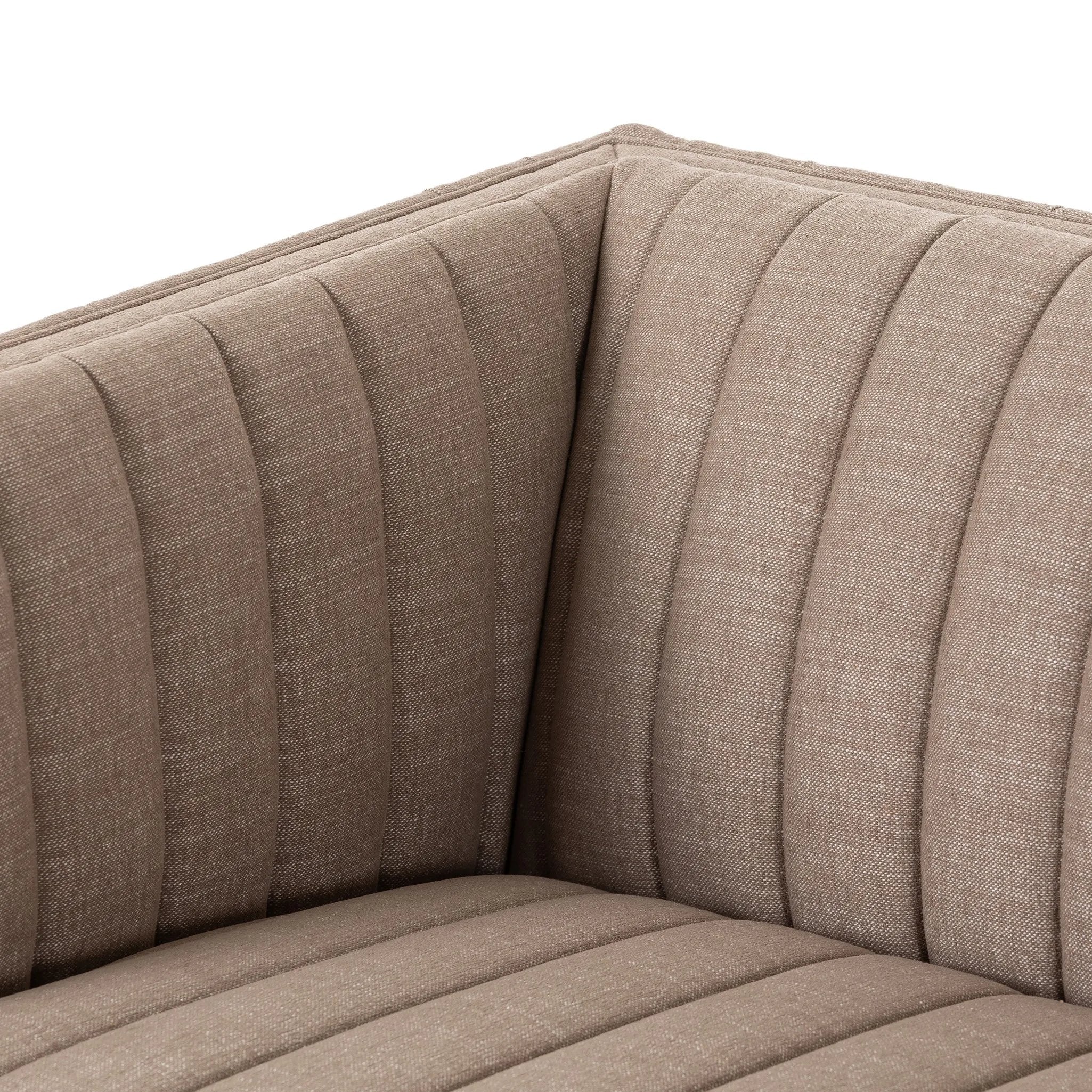 Velvety poly-blend seating takes on dramatic channeling and rich navy hue for trend-forward texture and sumptuous sit Amethyst Home provides interior design, new home construction design consulting, vintage area rugs, and lighting in the Des Moines metro area.