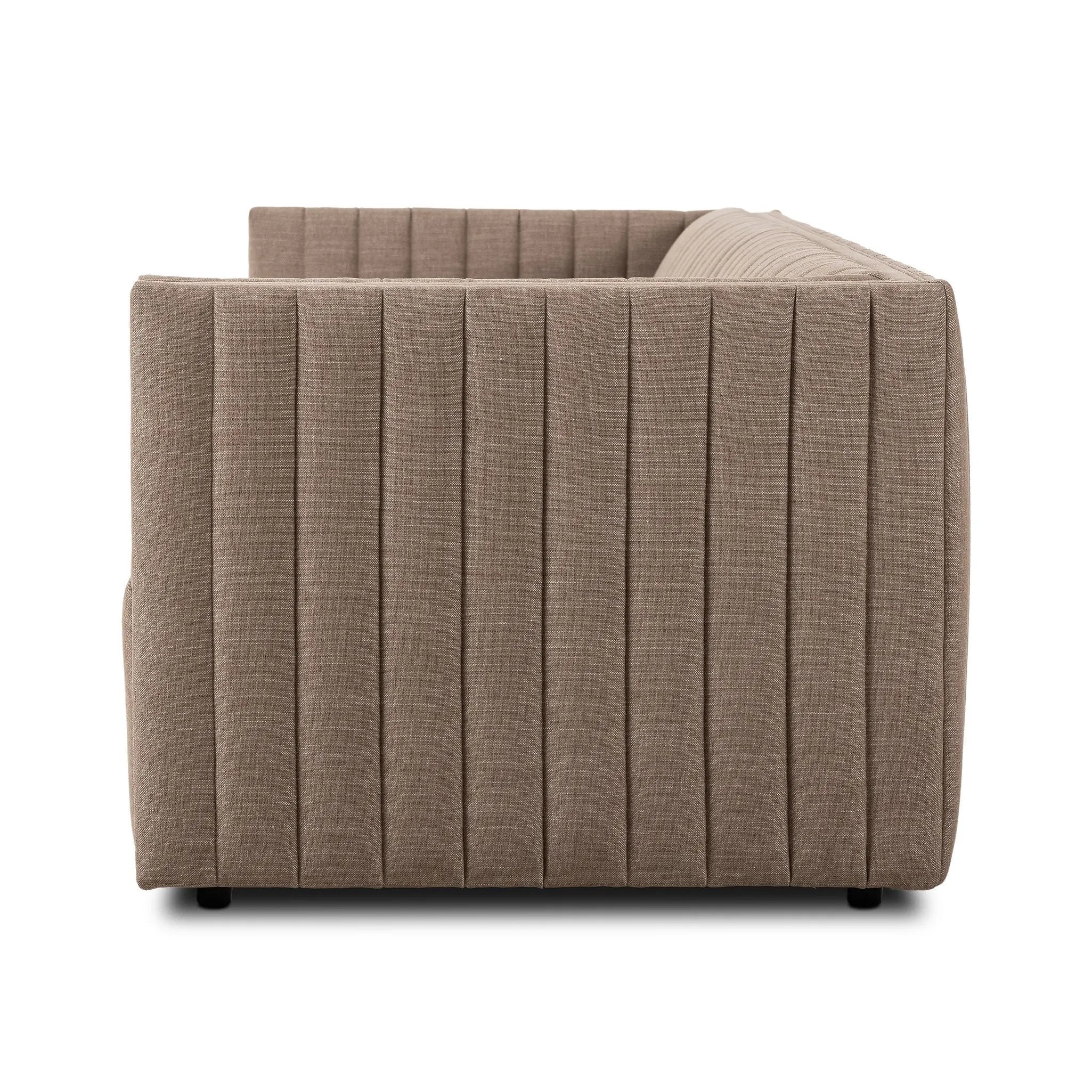 Velvety poly-blend seating takes on dramatic channeling and rich navy hue for trend-forward texture and sumptuous sit Amethyst Home provides interior design, new home construction design consulting, vintage area rugs, and lighting in the Houston metro area.