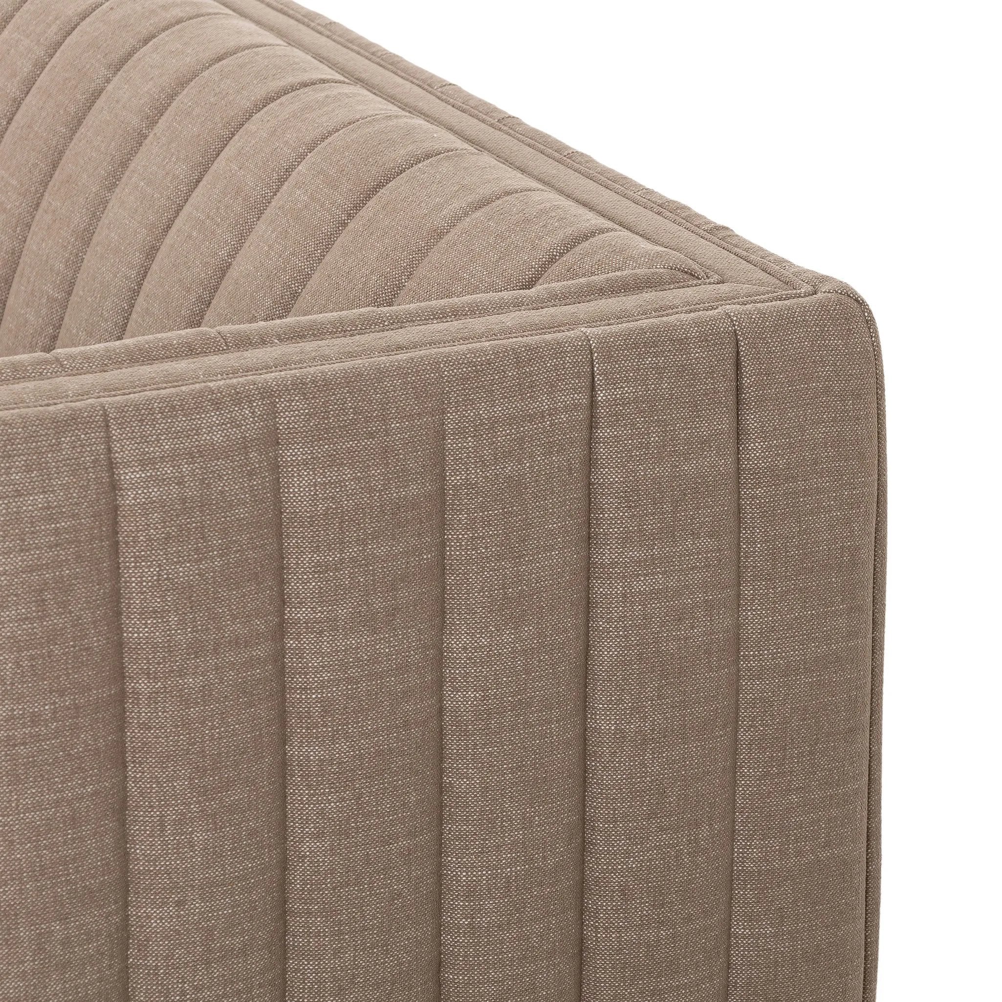 Velvety poly-blend seating takes on dramatic channeling and rich navy hue for trend-forward texture and sumptuous sit Amethyst Home provides interior design, new home construction design consulting, vintage area rugs, and lighting in the Laguna Beach metro area.