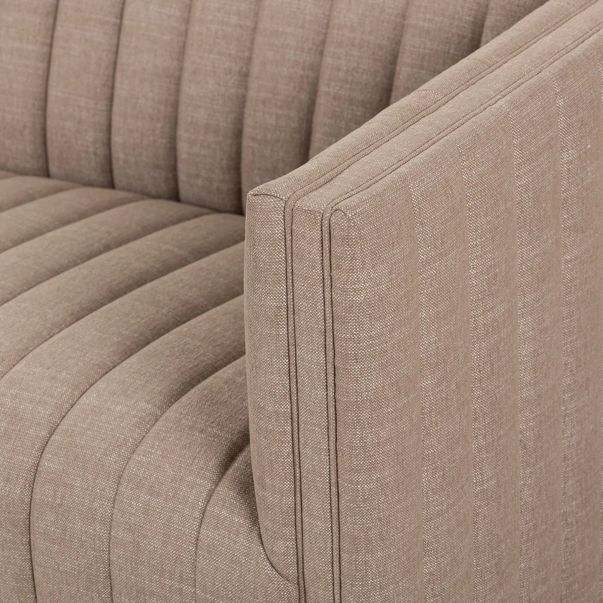 Velvety poly-blend seating takes on dramatic channeling and rich navy hue for trend-forward texture and sumptuous sit Amethyst Home provides interior design, new home construction design consulting, vintage area rugs, and lighting in the Park City metro area.
