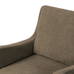 Heritage-inspired comfort. Sloping track arms are a study in playful forms, while the frame's fluid shape creates a simple, polished look. Tapered legs extend beyond a short skirt for a more relaxed style. Covered in 100% linen. A design collaboration by Amber Lewis and Four Hands. Amethyst Home provides interior design, new home construction design consulting, vintage area rugs, and lighting in the Los Angeles metro area.