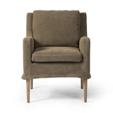 Heritage-inspired comfort. Sloping track arms are a study in playful forms, while the frame's fluid shape creates a simple, polished look. Tapered legs extend beyond a short skirt for a more relaxed style. Covered in 100% linen. A design collaboration by Amber Lewis and Four Hands. Amethyst Home provides interior design, new home construction design consulting, vintage area rugs, and lighting in the San Diego metro area.