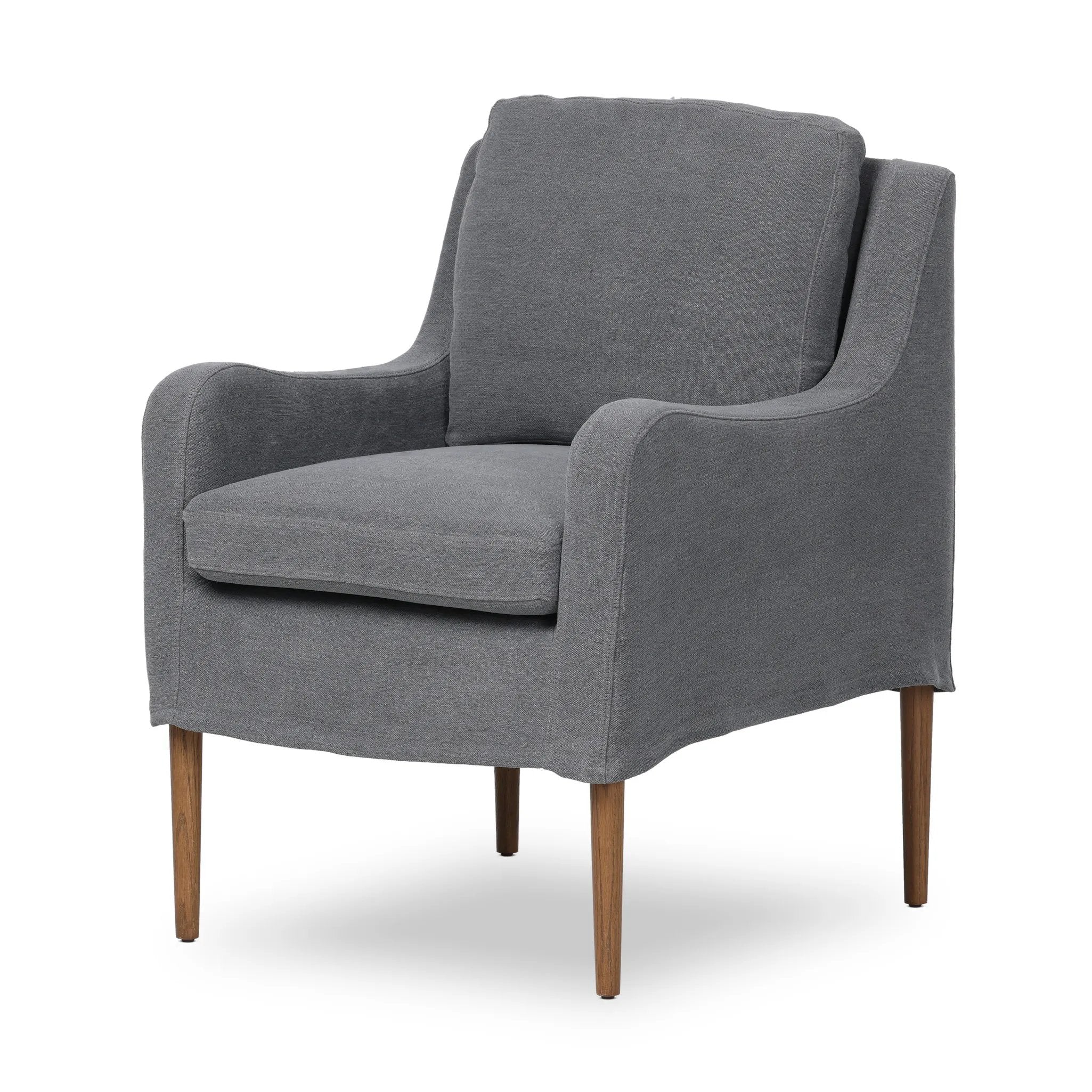 Heritage-inspired comfort. Sloping track arms are a study in playful forms, while the frame's fluid shape creates a simple, polished look. Tapered legs extend beyond a short skirt for a more relaxed style. Covered in 100% linen. A design collaboration by Amber Lewis and Four Hands. Amethyst Home provides interior design, new home construction design consulting, vintage area rugs, and lighting in the Calabasas metro area.