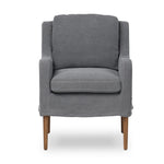Heritage-inspired comfort. Sloping track arms are a study in playful forms, while the frame's fluid shape creates a simple, polished look. Tapered legs extend beyond a short skirt for a more relaxed style. Covered in 100% linen. A design collaboration by Amber Lewis and Four Hands. Amethyst Home provides interior design, new home construction design consulting, vintage area rugs, and lighting in the Dallas metro area.