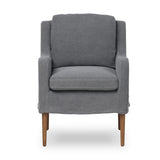 Heritage-inspired comfort. Sloping track arms are a study in playful forms, while the frame's fluid shape creates a simple, polished look. Tapered legs extend beyond a short skirt for a more relaxed style. Covered in 100% linen. A design collaboration by Amber Lewis and Four Hands. Amethyst Home provides interior design, new home construction design consulting, vintage area rugs, and lighting in the Dallas metro area.