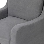 Heritage-inspired comfort. Sloping track arms are a study in playful forms, while the frame's fluid shape creates a simple, polished look. Tapered legs extend beyond a short skirt for a more relaxed style. Covered in 100% linen. A design collaboration by Amber Lewis and Four Hands. Amethyst Home provides interior design, new home construction design consulting, vintage area rugs, and lighting in the Salt Lake City metro area.