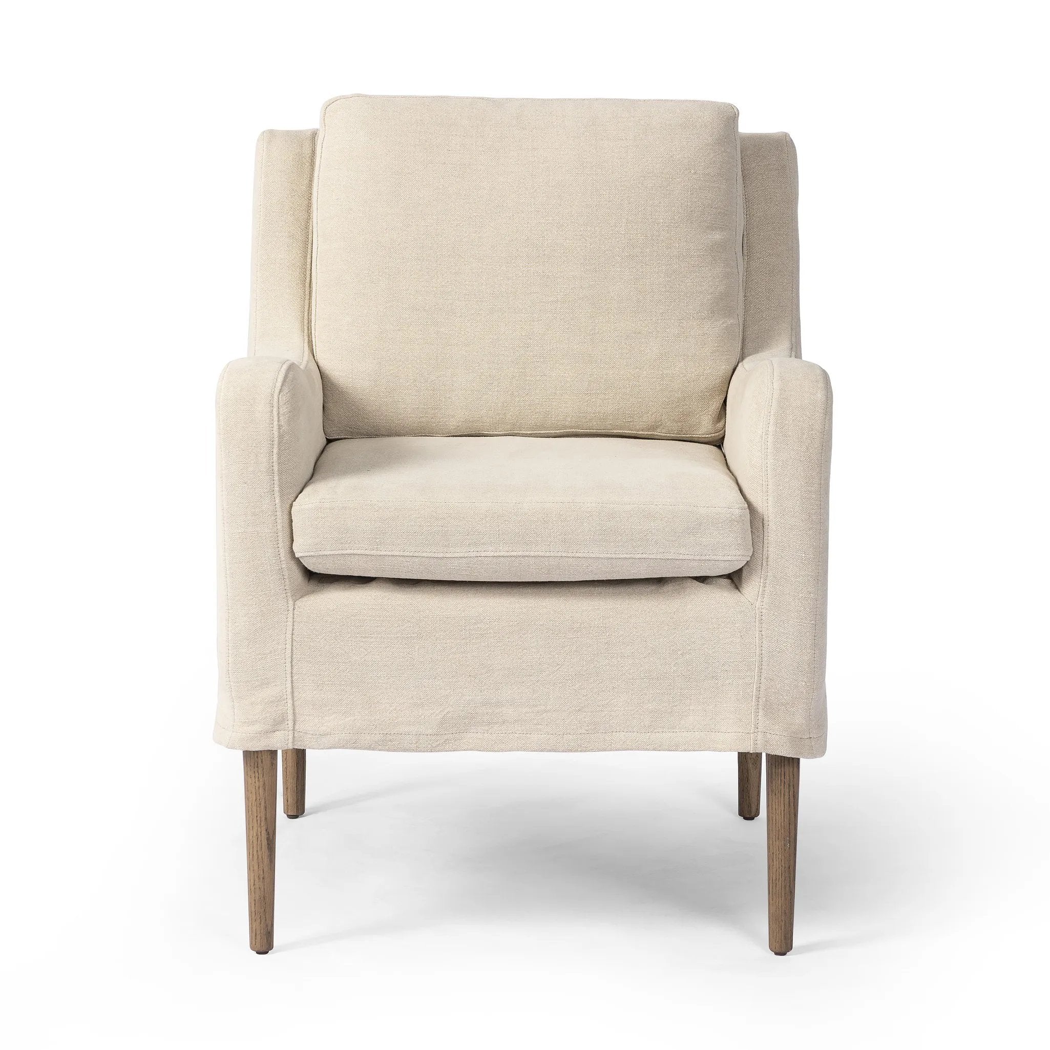 Heritage-inspired comfort. Sloping track arms are a study in playful forms, while the frame's fluid shape creates a simple, polished look. Tapered legs extend beyond a short skirt for a more relaxed style. Covered in 100% linen. A design collaboration by Amber Lewis and Four Hands. Amethyst Home provides interior design, new home construction design consulting, vintage area rugs, and lighting in the Des Moines metro area.