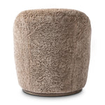 Intriguing while inviting, drum-style seating is upholstered in a soft, taupe shearling. A 360-degree swivel base of natural parawood places a fresh spin on a feminine form Amethyst Home provides interior design, new home construction design consulting, vintage area rugs, and lighting in the Newport Beach metro area.
