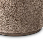 Intriguing while inviting, drum-style seating is upholstered in a soft, taupe shearling. A 360-degree swivel base of natural parawood places a fresh spin on a feminine form Amethyst Home provides interior design, new home construction design consulting, vintage area rugs, and lighting in the Park City metro area.