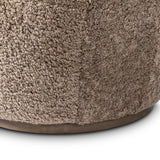 Intriguing while inviting, drum-style seating is upholstered in a soft, taupe shearling. A 360-degree swivel base of natural parawood places a fresh spin on a feminine form Amethyst Home provides interior design, new home construction design consulting, vintage area rugs, and lighting in the Park City metro area.