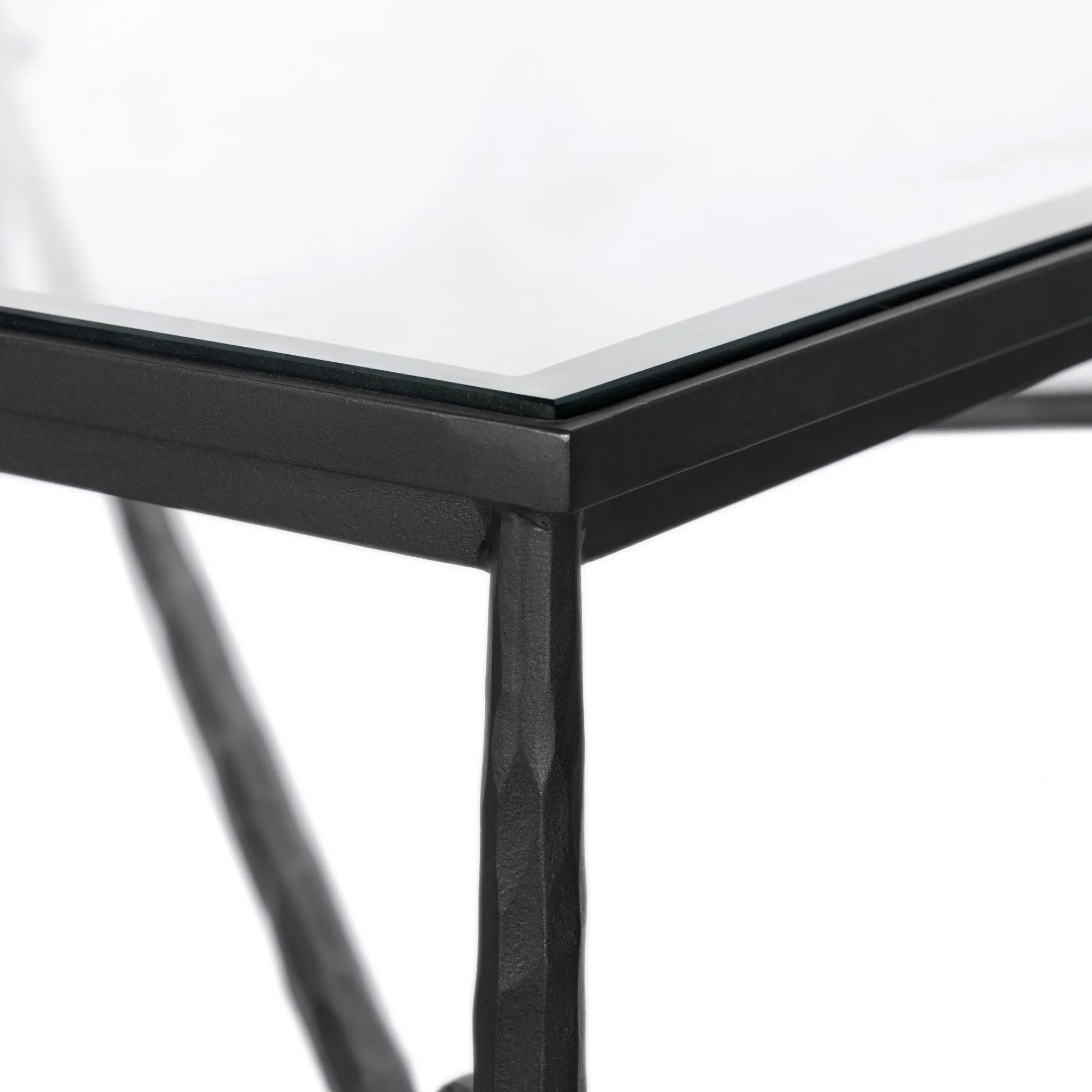 Featuring Babylon Tempered Glass Coffee Table by Four Hands at Amethyst Home. A slim, spare frame of hammered gunmetal pairs with tempered glass, for a clean and timeless coffee table look. Stretchers attach to metal loops for an elevated design detail.Overall Dimensions: 48.00"w x 48.00"d x 16.00"hWeight : 144.67 lbsMaterials: Tempered Glass, Iron. Amethyst Home provides interior design, new home construction design consulting, vintage area rugs, and lighting in the Tampa metro area.