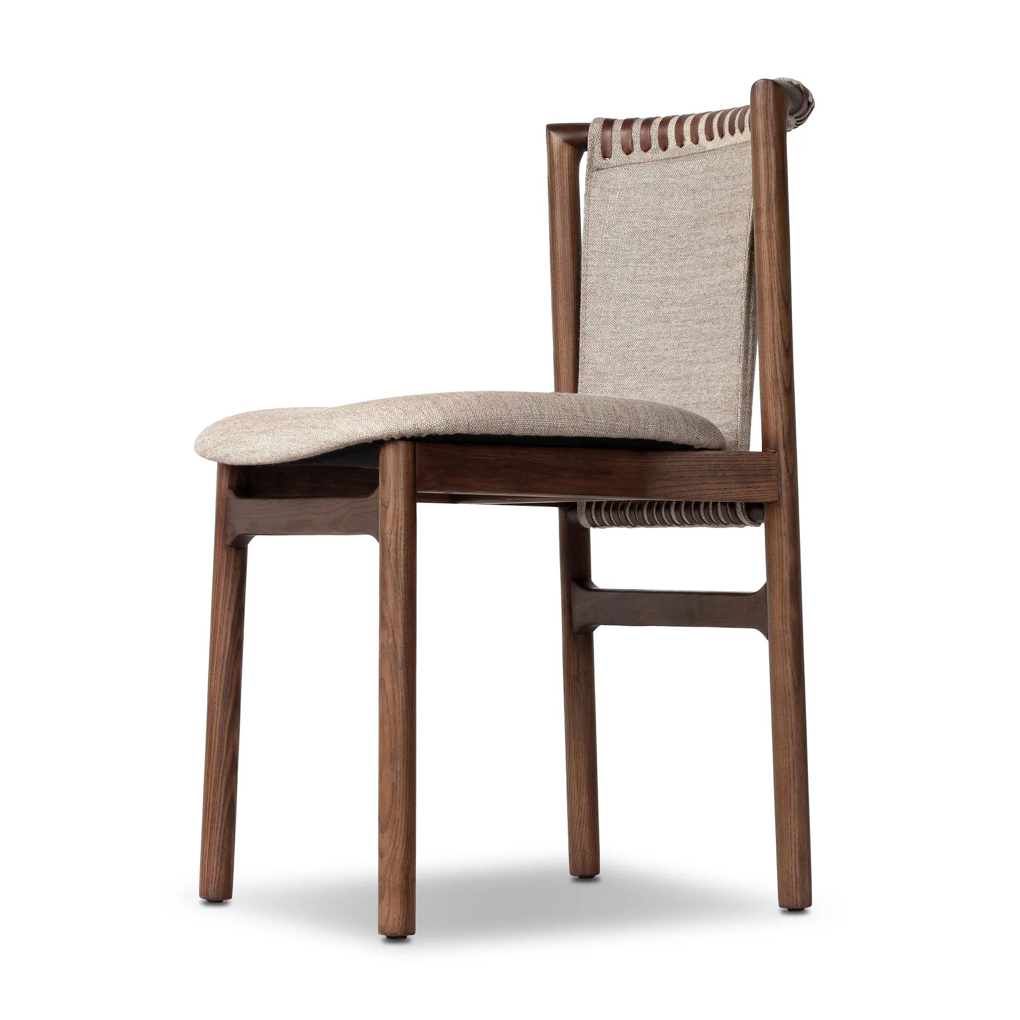Midcentury-inspired with its minimalist wooden frame, this armless dining chair features a low back and float-like upholstered seat Amethyst Home provides interior design, new home construction design consulting, vintage area rugs, and lighting in the Los Angeles metro area.