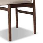 Midcentury-inspired with its minimalist wooden frame, this armless dining chair features a low back and float-like upholstered seat Amethyst Home provides interior design, new home construction design consulting, vintage area rugs, and lighting in the Omaha metro area.
