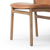 Featuring Baden Haven Tobacco Dining Chair by Four Hands at Amethyst Home. Midcentury-inspired with its minimalist wooden frame, this armless dining chair features a low back and float-like seat upholstered in tobacco top-grain leather exclusive to Four Hands. Leather wrap detailing for texture.Overall Dimensions: 19.75"w x 23.25"d x 32.25"hWeight : 14. Amethyst Home provides interior design, new home construction design consulting, vintage area rugs, and lighting in the Salt Lake City metro area.