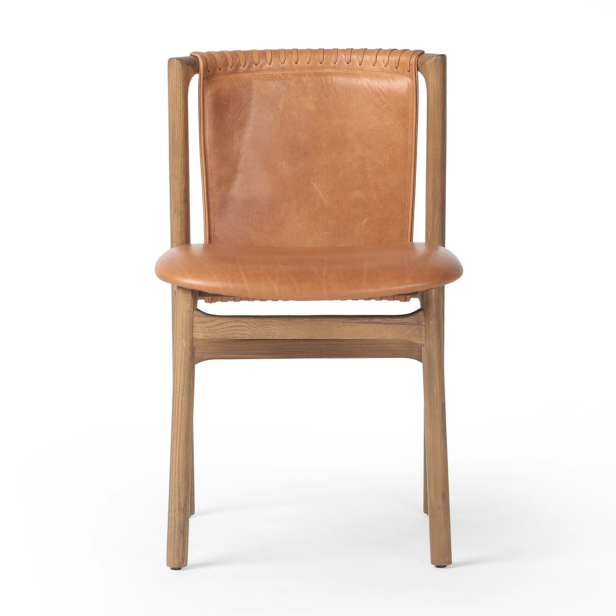 Featuring Baden Haven Tobacco Dining Chair by Four Hands at Amethyst Home. Midcentury-inspired with its minimalist wooden frame, this armless dining chair features a low back and float-like seat upholstered in tobacco top-grain leather exclusive to Four Hands. Leather wrap detailing for texture.Overall Dimensions: 19.75"w x 23.25"d x 32.25"hWeight : 14.99 . Amethyst Home provides interior design, new home construction design consulting, vintage area rugs, and lighting in the Scottsdale metro area.