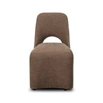 An armless dining chair fully upholstered in an inviting neutral coffee color, with a beautifully curved silhouette and arch-style cutout where the seat meets the back, creating a lightened sense of softness.As enthusiasts of modern design at Amethyst, we love the designer inspired Barclay Dining Chair - Laughlin Cafe. Amethyst Home provides interior design, new home construction design consulting, vintage area rugs, and lighting in the Portland metro area.