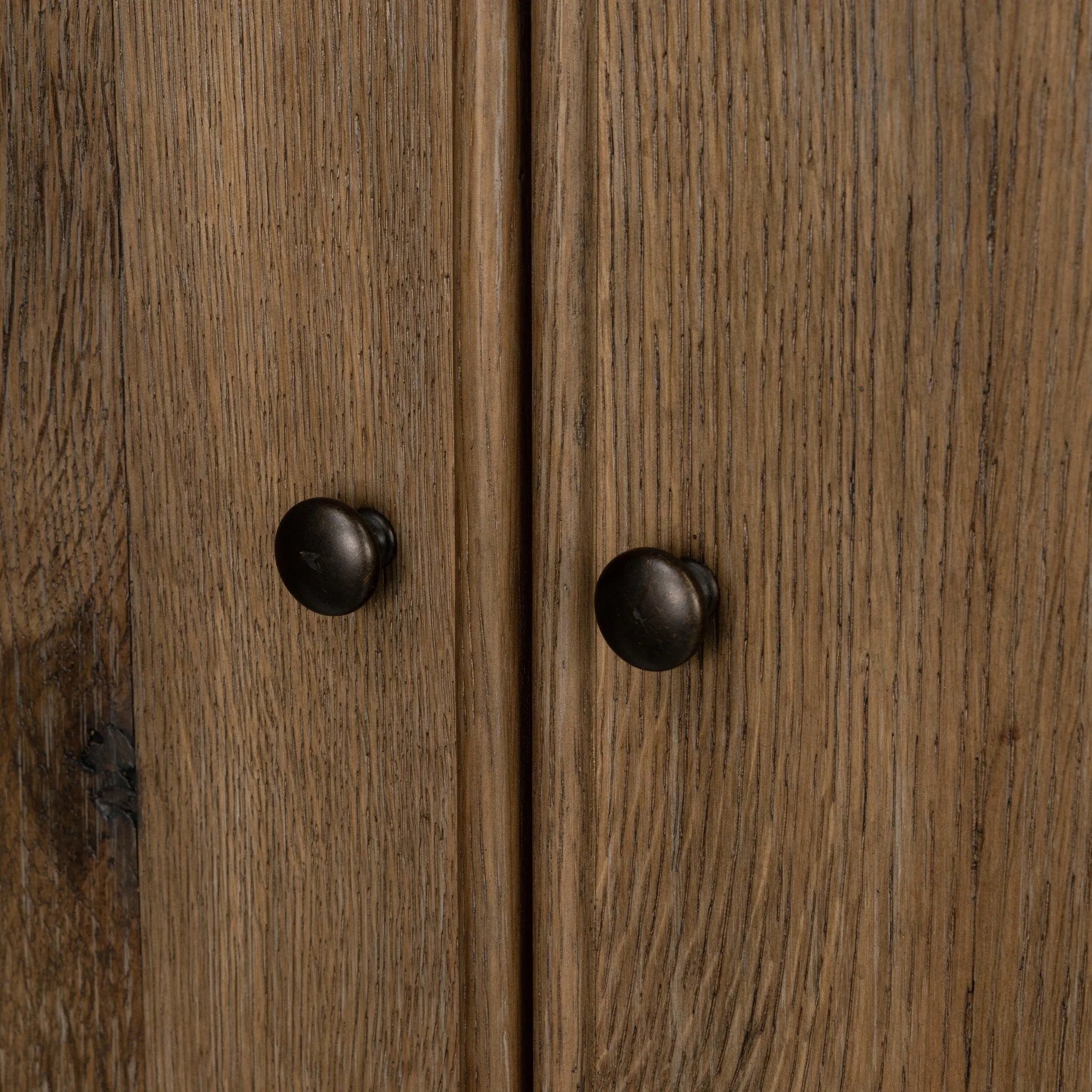 A classically constructed cabinet meets a clever storage solution. Two sets of large, flat-paneled doors conceal spacious shelves. Subtle hardware accents weathered oak. A design collaboration by Amber Lewis and Four Hands. This item has limited online distribution and may not be sold on websites without prior approval. Amethyst Home provides interior design, new home construction design consulting, vintage area rugs, and lighting in the Charlotte metro area.