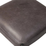 Bring a refreshed midcentury look to your table. Comfortable seat and back cushions are upholstered in a black top-grain leather, with a slim iron frame curving at the top to soften things up. Simple tapered legs complete the look.As enthusiasts of natural aesthetics at Amethyst, we love the nature inspired Bellaire Dining Chair - Palermo Black. Amethyst Home provides interior design, new home construction design consulting, vintage area rugs, and lighting in the Charlotte metro area.