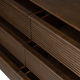 Inspired by aerodynamic-inspired Streamline Moderne style, stacked scalloped reeding wraps this spiced oak dresser with six spacious drawers. The result: a beautifully rhythmic, repeated look. With integrated hardware for a clean finish.As fans of natural materials at Amethyst, we love the nature inspired Benny 6 Drawer Dresser - Spiced Oak Veneer. Amethyst Home provides interior design, new home construction design consulting, vintage area rugs, and lighting in the Charlotte metro area.