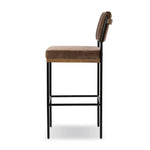 Simple and streamlined with thoughtful details. Slim, black-finished iron frame with solid oak decking, plus black top-grain leather seating for modernity. A stylish staple for any counter Amethyst Home provides interior design, new home construction design consulting, vintage area rugs, and lighting in the Nashville metro area.