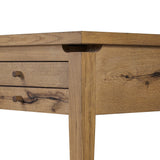 Warm up your workspace with this light-finished writing desk of rich character oak. Tapered legs and subtle corner relief details create a simplified look that complements a home office or flex space. Amethyst Home provides interior design, new home construction design consulting, vintage area rugs, and lighting in the San Diego metro area.