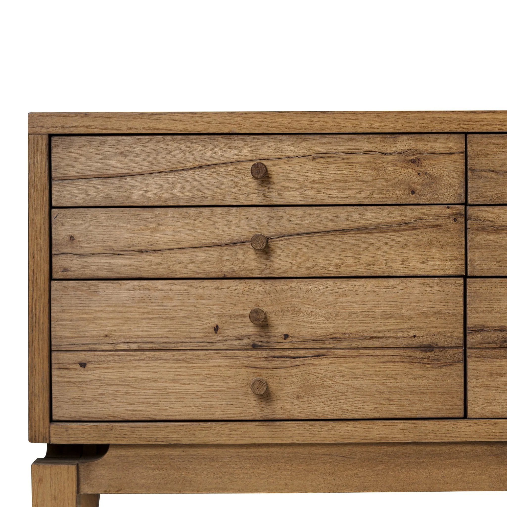 Light, natural oak reflects the New American inspiration behind this storage-driven console of warm, natural oak. Elevated on tapered legs with corner relief accents, its asymmetrical design offers storage for your media needs and more Amethyst Home provides interior design, new home construction design consulting, vintage area rugs, and lighting in the Laguna Beach metro area.