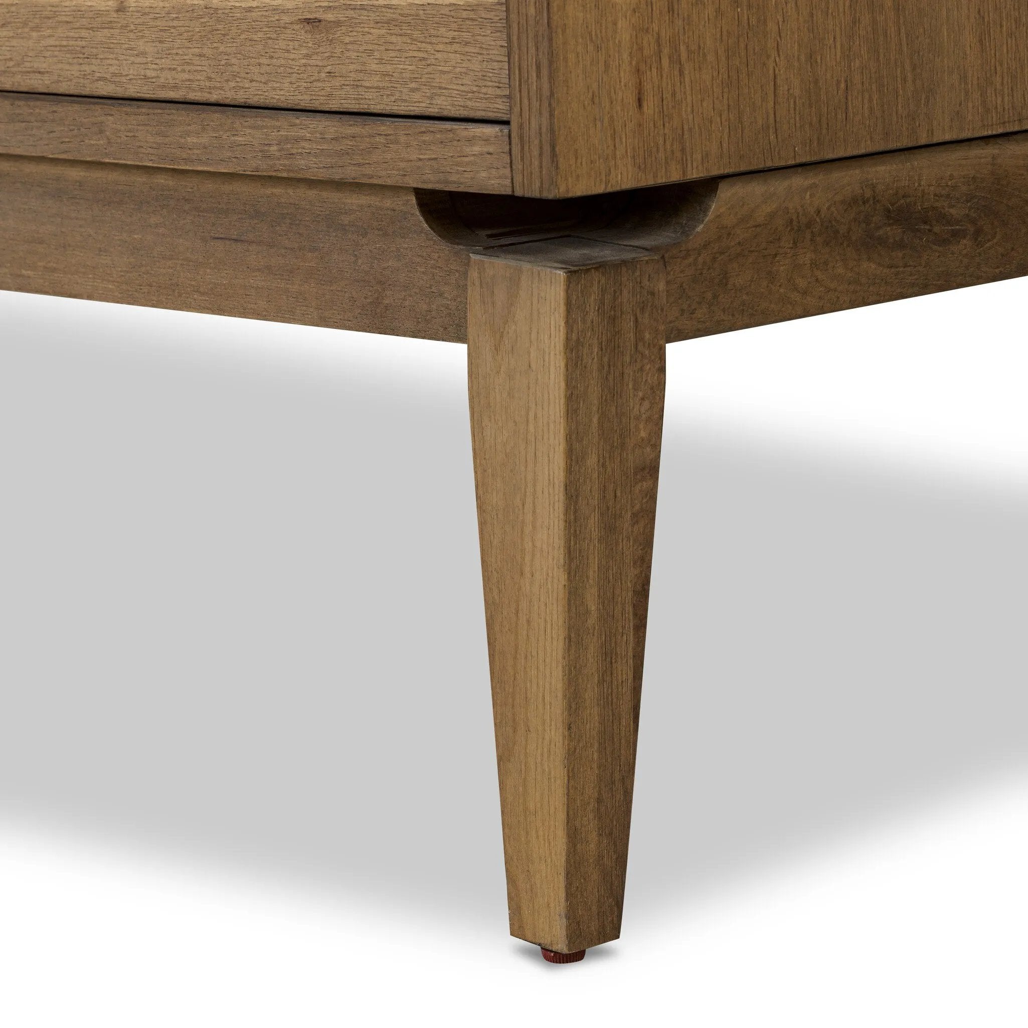 Light, natural oak reflects the New American inspiration behind this storage-driven console of warm, natural oak. Elevated on tapered legs with corner relief accents, its asymmetrical design offers storage for your media needs and more Amethyst Home provides interior design, new home construction design consulting, vintage area rugs, and lighting in the Miami metro area.