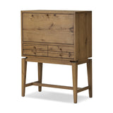 Featuring Bergstrom Warm Natural Oak Veneer Secretary Desk by Four Hands at Amethyst Home. A fresh take on the traditional secretary desk, made from warm natural oak. A flip-down top creates a wide writing surface, offering the perfect place to pen a handwritten note. Overall Dimensions: 35.00"w x 18.00"d x 48.00"h. Amethyst Home provides interior design, new home construction design consulting, vintage area rugs, and lighting in the Kansas City metro area.