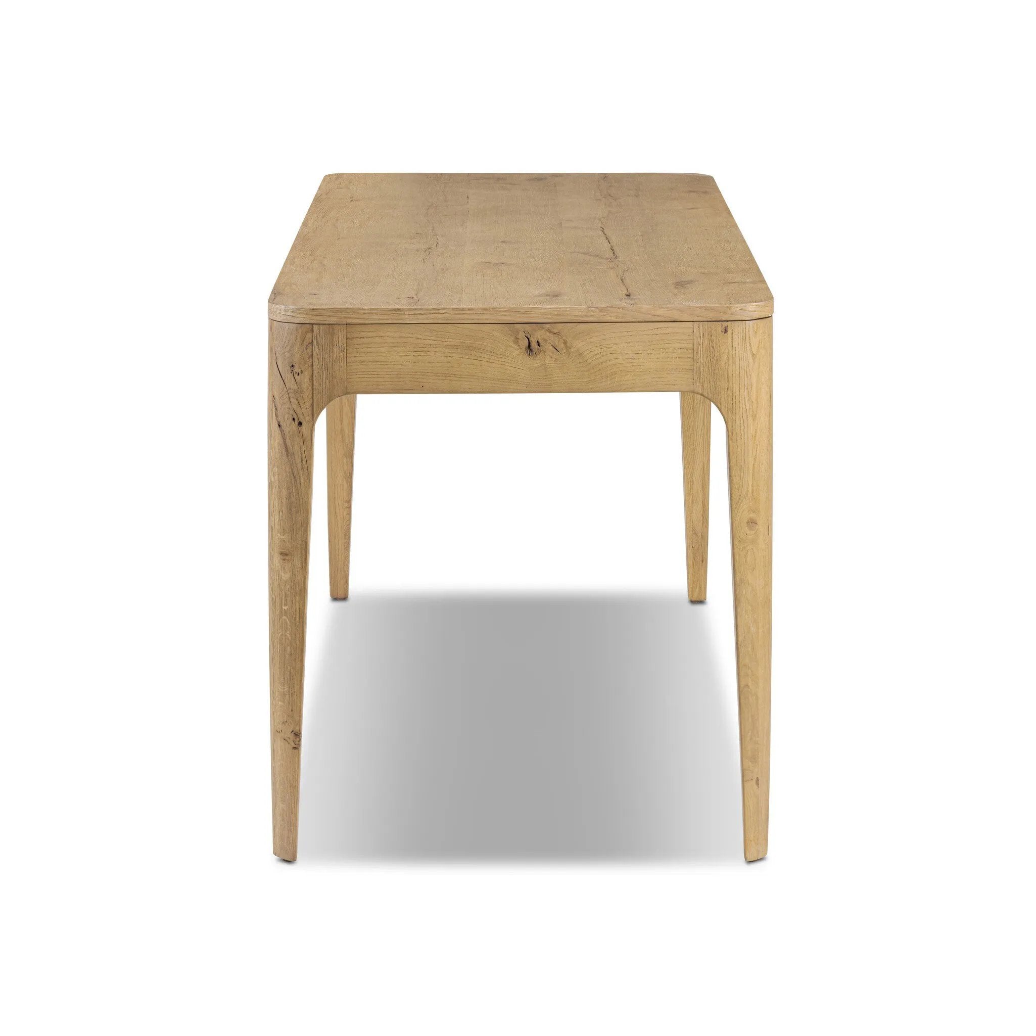 Tapered, curved legs highlight this three-drawer aged-oak writing desk crafted with solid and thick wood veneers Amethyst Home provides interior design, new home construction design consulting, vintage area rugs, and lighting in the Kansas City metro area.