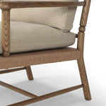 Featuring Bethan Antwerp Taupe Chair by Four Hands at Amethyst Home. Unique texture modernizes this vintage-inspired design. On its back, natural paper cord is woven into a geometric windowpane, for a truly unique touch. Paddle arms, eased edges and petite finials reflect the expert artisanship behind this versatile piece, while feather-blend box cushions invit. Amethyst Home provides interior design, new home construction design consulting, vintage area rugs, and lighting in the Tampa metro area.