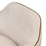 Laid-back wing styling adds dramatic form to this tailored 360-degree swivel chair upholstered in poly-linen performance fabric. The flared arms and comfortable S-spring seat are outlined in piping. Performance fabrics are specially created to withstand spills, stains, high traffic and wear, ensuring long-term comfort and unmatched durability Amethyst Home provides interior design, new home construction design consulting, vintage area rugs, and lighting in the Dallas metro area.