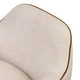 Laid-back wing styling adds dramatic form to this tailored 360-degree swivel chair upholstered in poly-linen performance fabric. The flared arms and comfortable S-spring seat are outlined in piping. Performance fabrics are specially created to withstand spills, stains, high traffic and wear, ensuring long-term comfort and unmatched durability Amethyst Home provides interior design, new home construction design consulting, vintage area rugs, and lighting in the Dallas metro area.