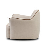 Laid-back wing styling adds dramatic form to this tailored 360-degree swivel chair upholstered in poly-linen performance fabric. The flared arms and comfortable S-spring seat are outlined in piping. Performance fabrics are specially created to withstand spills, stains, high traffic and wear, ensuring long-term comfort and unmatched durability Amethyst Home provides interior design, new home construction design consulting, vintage area rugs, and lighting in the Seattle metro area.