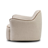 Laid-back wing styling adds dramatic form to this tailored 360-degree swivel chair upholstered in poly-linen performance fabric. The flared arms and comfortable S-spring seat are outlined in piping. Performance fabrics are specially created to withstand spills, stains, high traffic and wear, ensuring long-term comfort and unmatched durability Amethyst Home provides interior design, new home construction design consulting, vintage area rugs, and lighting in the Seattle metro area.