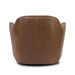 Smooth lines and impeccable tailoring bring a clean, elevated look to this modernized 360 swivel chair. Made from top-grain leather with a rich mahogany finish, flared arms and piping trim reflect the intention behind this timeless design Amethyst Home provides interior design, new home construction design consulting, vintage area rugs, and lighting in the Laguna Beach metro area.