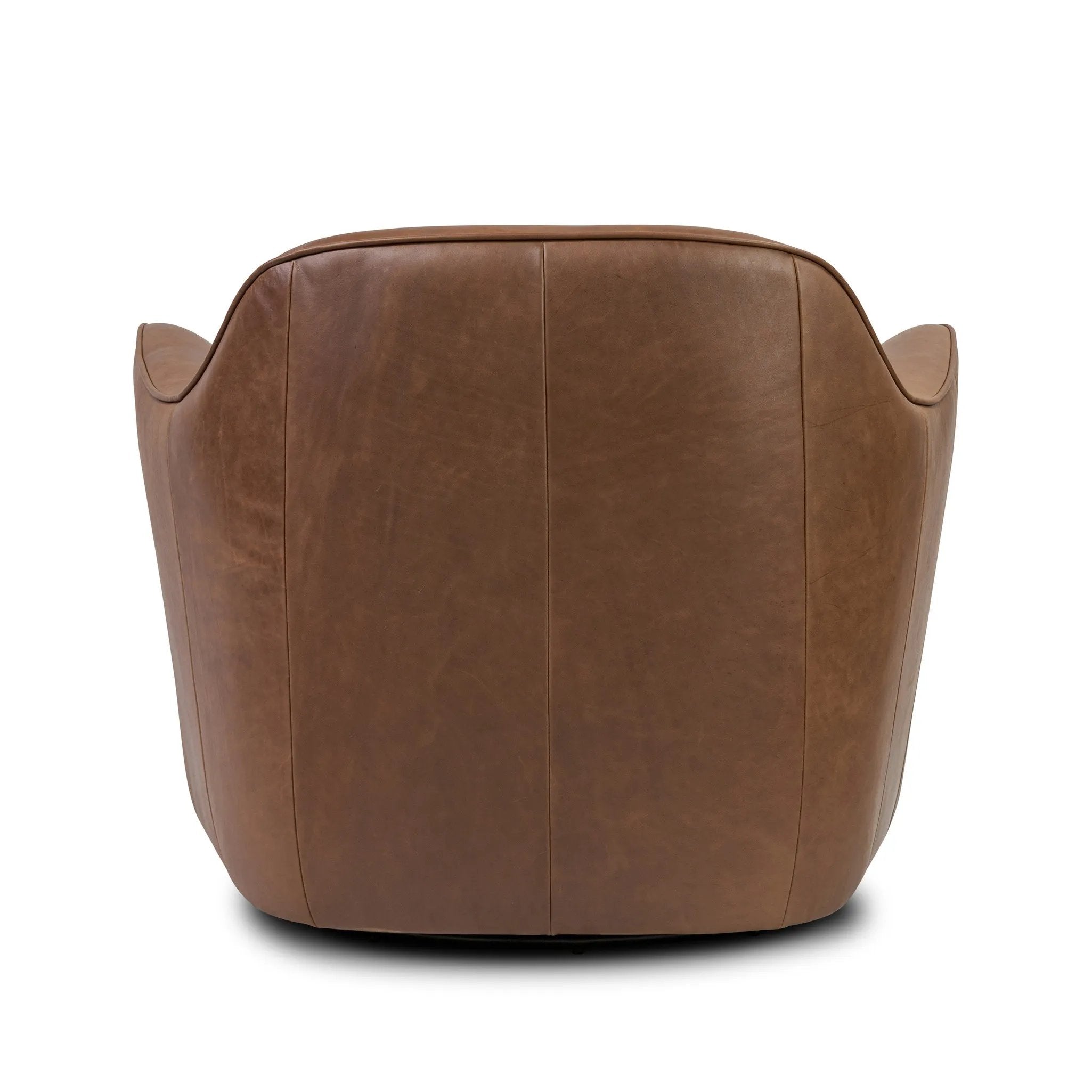 Smooth lines and impeccable tailoring bring a clean, elevated look to this modernized 360 swivel chair. Made from top-grain leather with a rich mahogany finish, flared arms and piping trim reflect the intention behind this timeless design Amethyst Home provides interior design, new home construction design consulting, vintage area rugs, and lighting in the Laguna Beach metro area.