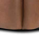 Smooth lines and impeccable tailoring bring a clean, elevated look to this modernized 360 swivel chair. Made from top-grain leather with a rich mahogany finish, flared arms and piping trim reflect the intention behind this timeless design Amethyst Home provides interior design, new home construction design consulting, vintage area rugs, and lighting in the Monterey metro area.