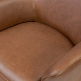 Smooth lines and impeccable tailoring bring a clean, elevated look to this modernized 360 swivel chair. Made from top-grain leather with a rich mahogany finish, flared arms and piping trim reflect the intention behind this timeless design Amethyst Home provides interior design, new home construction design consulting, vintage area rugs, and lighting in the Newport Beach metro area.