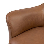 Smooth lines and impeccable tailoring bring a clean, elevated look to this modernized 360 swivel chair. Made from top-grain leather with a rich mahogany finish, flared arms and piping trim reflect the intention behind this timeless design Amethyst Home provides interior design, new home construction design consulting, vintage area rugs, and lighting in the Winter Garden metro area.