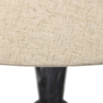 Polished forms define this sculptural table lamp, featuring a base of black Italian marble with distinctive white veining and a tapered flax linen shade Amethyst Home provides interior design, new home construction design consulting, vintage area rugs, and lighting in the Des Moines metro area.