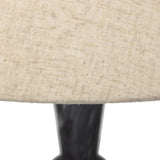 Polished forms define this sculptural table lamp, featuring a base of black Italian marble with distinctive white veining and a tapered flax linen shade Amethyst Home provides interior design, new home construction design consulting, vintage area rugs, and lighting in the Des Moines metro area.